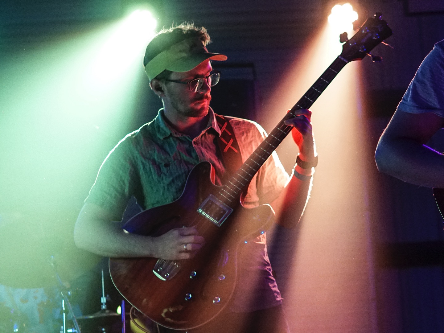 Rosewater Guitarist with Stage Lights